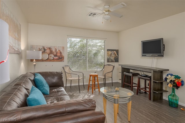 2068 Mesquite Ln Unit 203, Laughlin, NV 89029 - living area with a ceiling fan and wood finished floors