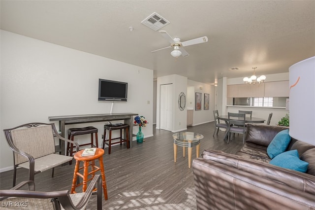 2068 Mesquite Ln Unit 203, Laughlin, NV 89029 - living room featuring a chandelier, wood finished floors, and ceiling fan