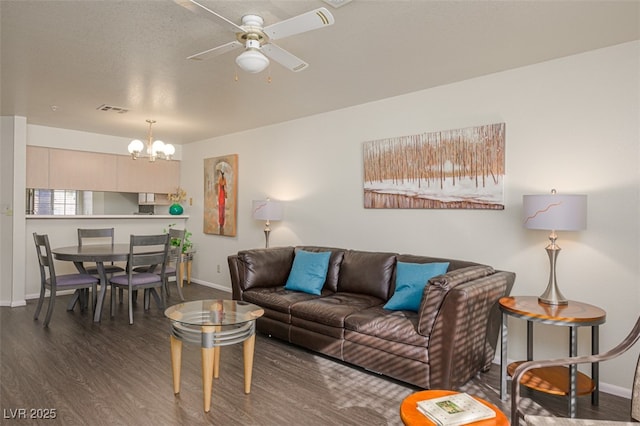 2068 Mesquite Ln Unit 203, Laughlin, NV 89029 - living area with a chandelier, wood finished floors, and ceiling fan