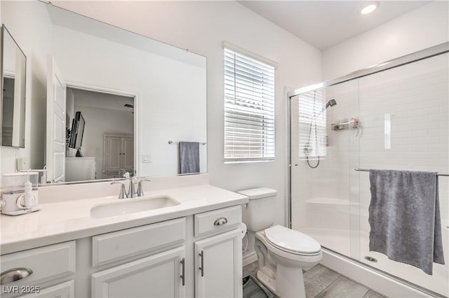 3821 Nesting Wren Dr, North Las Vegas, NV 89084 - full bathroom with a shower stall, vanity, wood finished floors, and recessed lighting