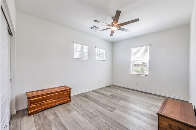 3821 Nesting Wren Dr, North Las Vegas, NV 89084 - unfurnished bedroom with light wood-style floors and ceiling fan