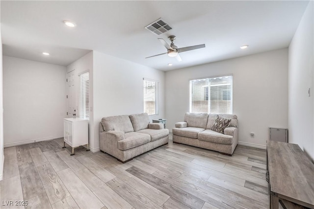 3821 Nesting Wren Dr, North Las Vegas, NV 89084 - living room with light wood-style flooring, a ceiling fan, and recessed lighting