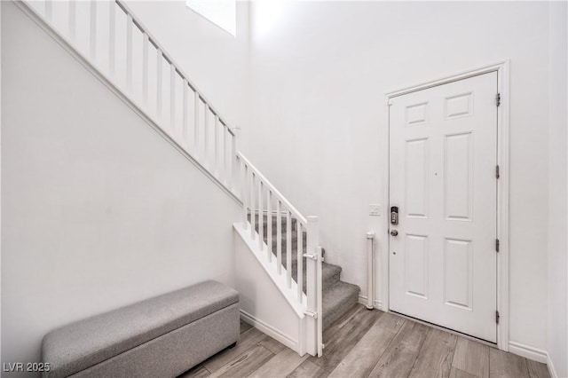 3821 Nesting Wren Dr, North Las Vegas, NV 89084 - entryway featuring stairway and light wood-type flooring