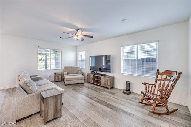 3821 Nesting Wren Dr, North Las Vegas, NV 89084 - living room featuring light wood-style flooring and ceiling fan