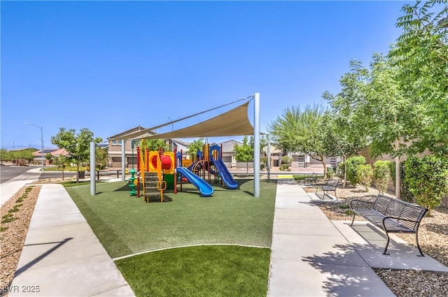 3821 Nesting Wren Dr, North Las Vegas, NV 89084 - communal playground featuring a lawn