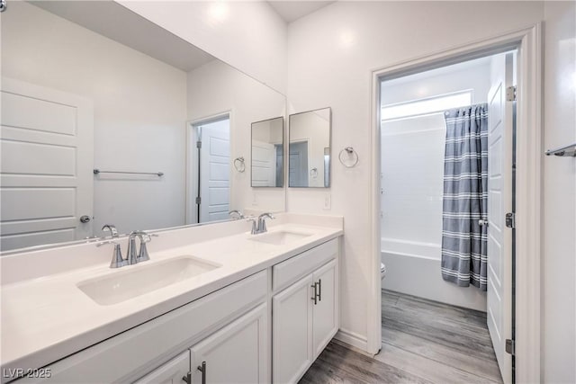 3821 Nesting Wren Dr, North Las Vegas, NV 89084 - full bath with wood finished floors, double vanity, and shower / bath combination with curtain