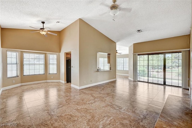 5401 Broadwater Ln, Las Vegas, NV 89130 - unfurnished living room featuring ceiling fan, a textured ceiling, and high vaulted ceiling