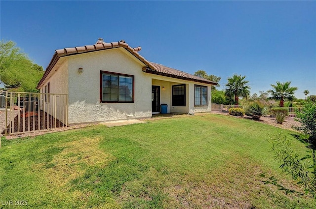 5401 Broadwater Ln, Las Vegas, NV 89130 - rear view of property with stucco siding and a tile roof