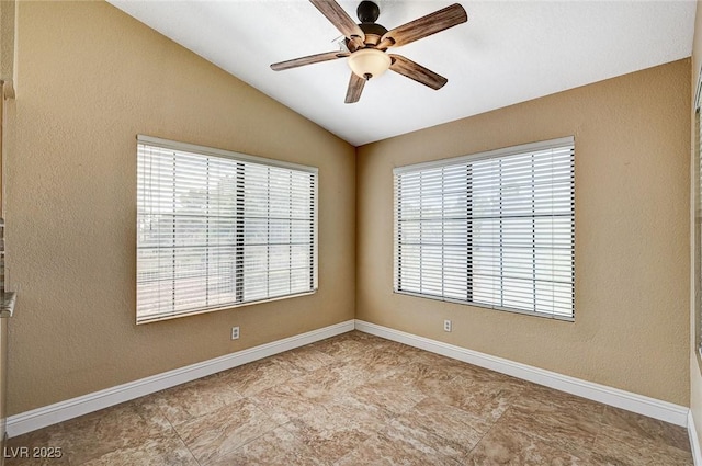 5401 Broadwater Ln, Las Vegas, NV 89130 - spare room featuring ceiling fan and vaulted ceiling