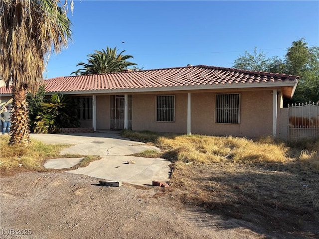 4928 E Philadelphia Ave, Las Vegas, NV 89104 - ranch-style house featuring stucco siding and a tile roof