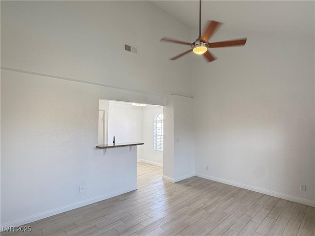 3606 Di Salvo Dr Unit 133, Las Vegas, NV 89103 - spare room featuring a ceiling fan, high vaulted ceiling, and light wood finished floors