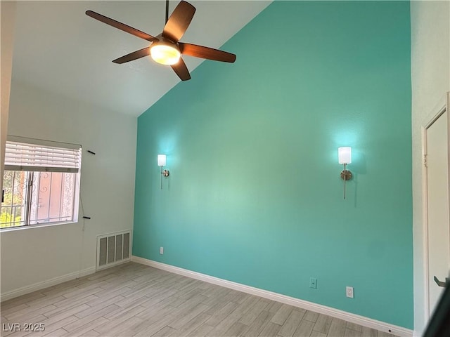 3606 Di Salvo Dr Unit 133, Las Vegas, NV 89103 - empty room with ceiling fan, light wood-type flooring, and high vaulted ceiling