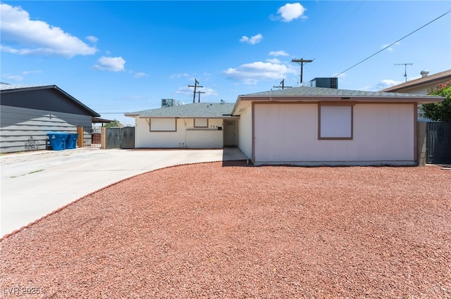 704 N Wallace Dr, Las Vegas, NV 89107 - back of house with concrete driveway