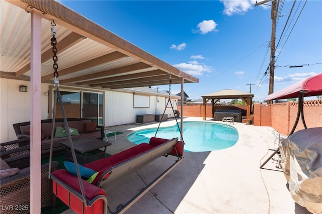704 N Wallace Dr, Las Vegas, NV 89107 - view of swimming pool featuring a gazebo, a hot tub, a patio, and a fenced backyard