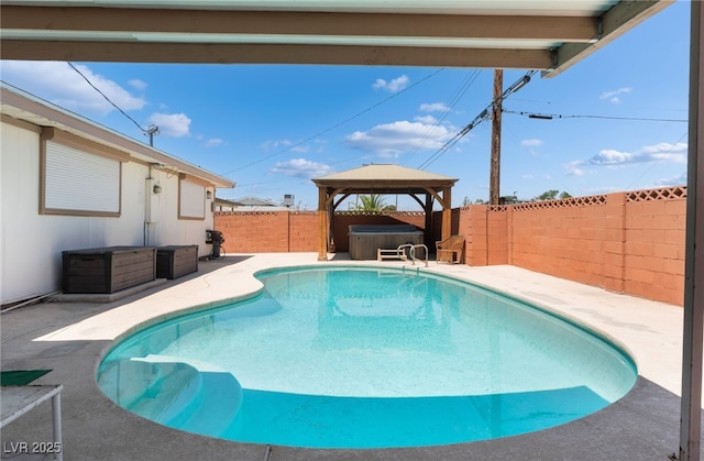 704 N Wallace Dr, Las Vegas, NV 89107 - view of pool with a patio area, a hot tub, a fenced backyard, and a gazebo