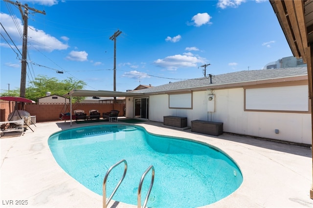 704 N Wallace Dr, Las Vegas, NV 89107 - view of swimming pool featuring a patio and a fenced backyard