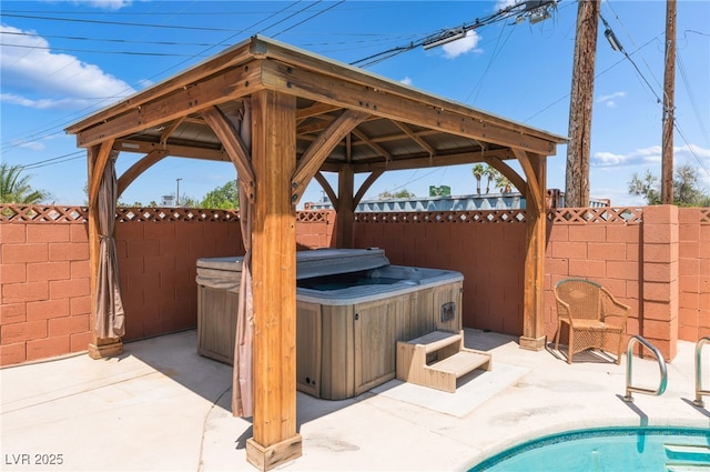 704 N Wallace Dr, Las Vegas, NV 89107 - fenced backyard with a hot tub, a gazebo, a patio area, and an outdoor pool