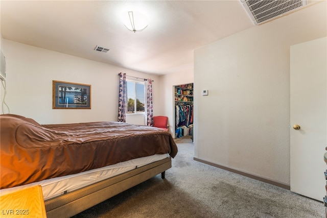 704 N Wallace Dr, Las Vegas, NV 89107 - carpeted bedroom featuring a spacious closet and a closet