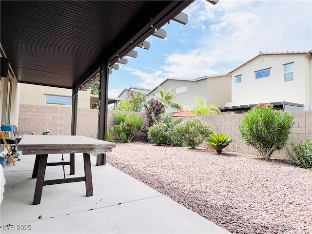6230 Bravestar Ct, Las Vegas, NV 89141 - fenced backyard featuring a patio
