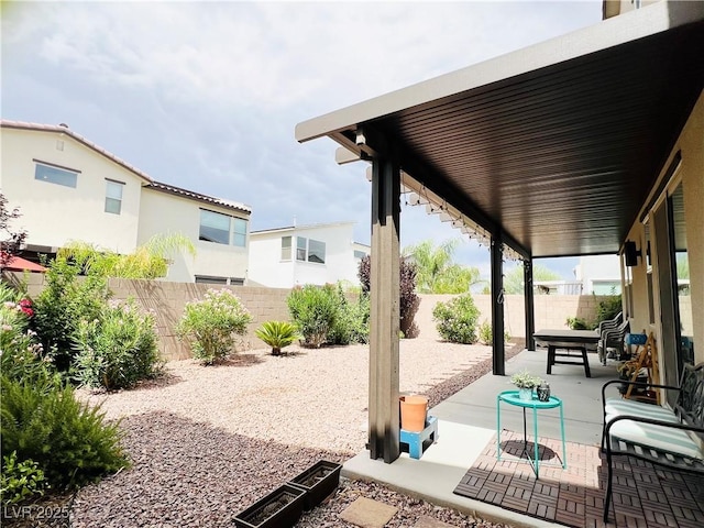 6230 Bravestar Ct, Las Vegas, NV 89141 - fenced backyard featuring a patio area