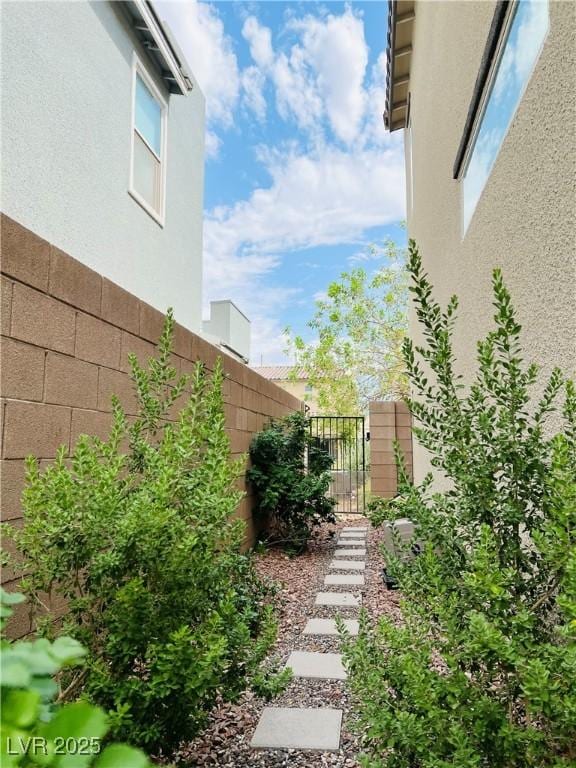 6230 Bravestar Ct, Las Vegas, NV 89141 - view of yard with a gate