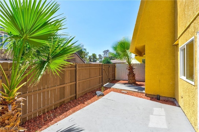 1480 Hialeah Dr Unit B, Las Vegas, NV 89119 - fenced backyard featuring a patio area