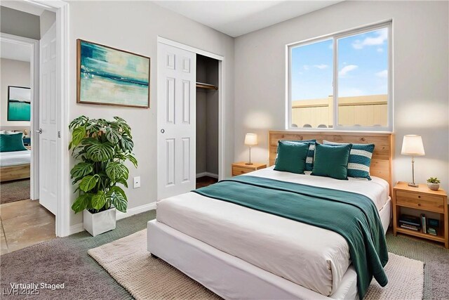 2175 Limestone Cove Ct, Laughlin, NV 89029 - bedroom with carpet floors and a closet