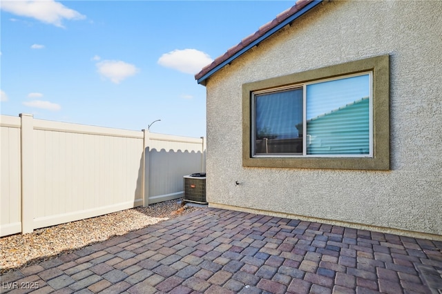 2175 Limestone Cove Ct, Laughlin, NV 89029 - fenced backyard with a patio area
