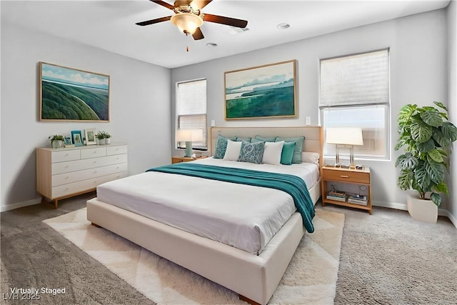 2175 Limestone Cove Ct, Laughlin, NV 89029 - bedroom with carpet, multiple windows, and ceiling fan