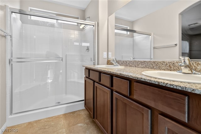 2175 Limestone Cove Ct, Laughlin, NV 89029 - bathroom featuring a stall shower and double vanity