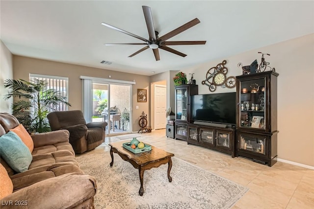 7224 Piute Mesa St, North Las Vegas, NV 89084 - living room featuring ceiling fan and light tile patterned floors
