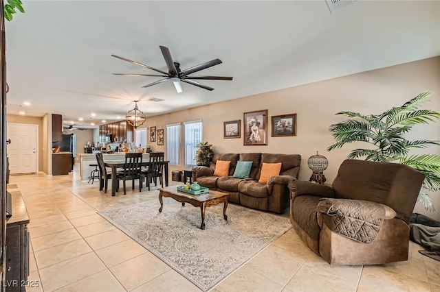 7224 Piute Mesa St, North Las Vegas, NV 89084 - living area with a ceiling fan, light tile patterned floors, recessed lighting, and a chandelier