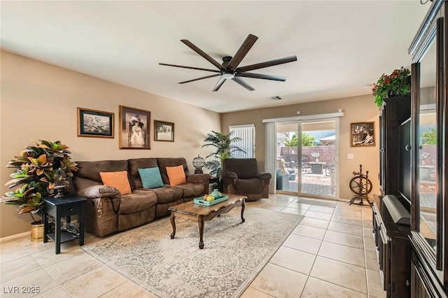 7224 Piute Mesa St, North Las Vegas, NV 89084 - living room featuring a ceiling fan and light tile patterned floors