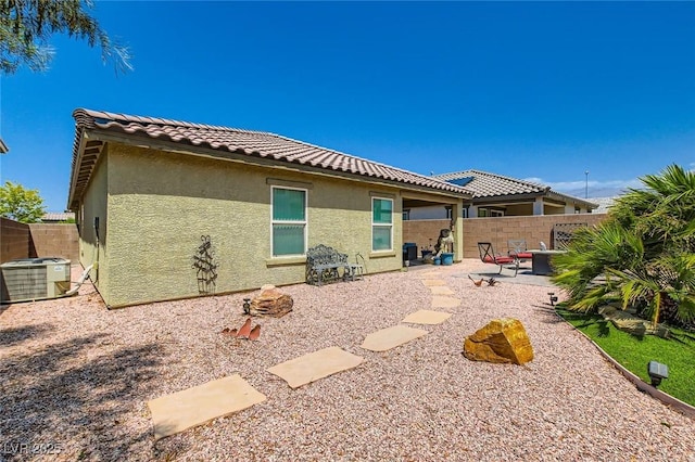 7224 Piute Mesa St, North Las Vegas, NV 89084 - rear view of property with stucco siding, a patio area, and a tiled roof