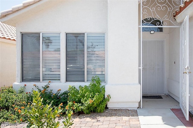 5233 Camino Del Rancho, Las Vegas, NV 89130 - doorway to property featuring stucco siding