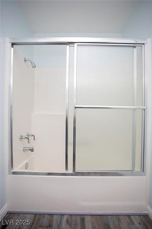5233 Camino Del Rancho, Las Vegas, NV 89130 - bathroom featuring combined bath / shower with glass door and wood finished floors