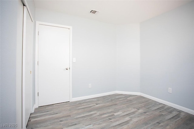 5233 Camino Del Rancho, Las Vegas, NV 89130 - spare room featuring wood finished floors