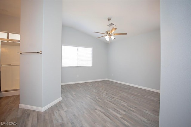 5233 Camino Del Rancho, Las Vegas, NV 89130 - empty room featuring a ceiling fan, wood finished floors, and lofted ceiling