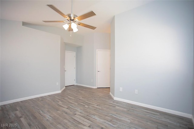 5233 Camino Del Rancho, Las Vegas, NV 89130 - unfurnished room with vaulted ceiling, wood finished floors, and ceiling fan