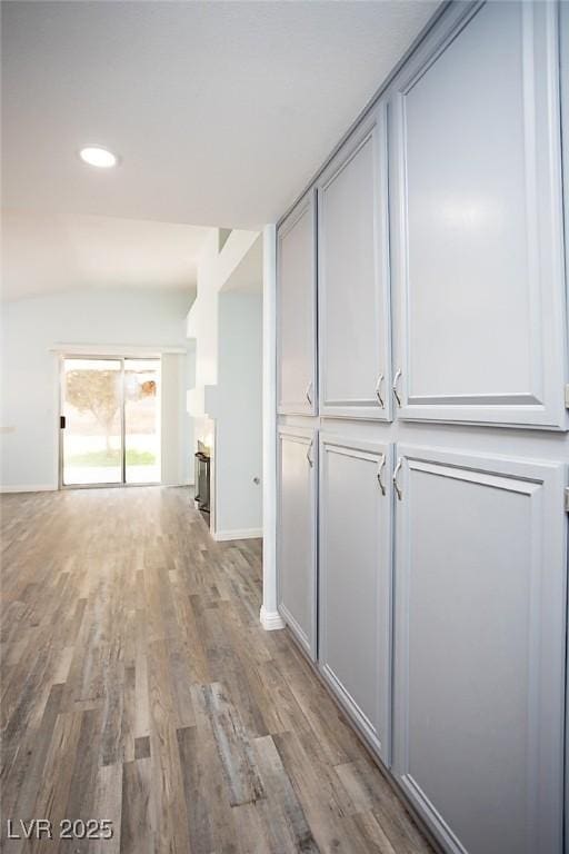 5233 Camino Del Rancho, Las Vegas, NV 89130 - hall with wood finished floors, lofted ceiling, and recessed lighting