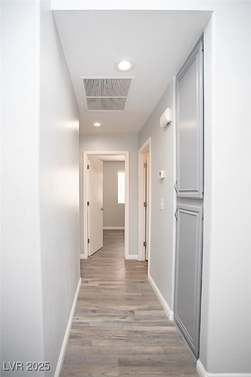 5233 Camino Del Rancho, Las Vegas, NV 89130 - hallway featuring light wood-type flooring and recessed lighting