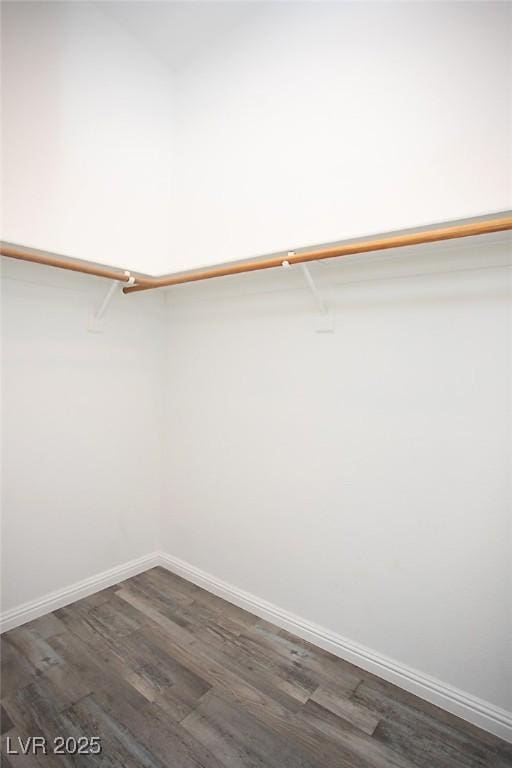 5233 Camino Del Rancho, Las Vegas, NV 89130 - walk in closet featuring dark wood-style flooring