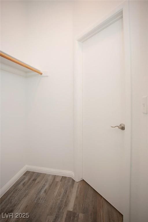 5233 Camino Del Rancho, Las Vegas, NV 89130 - walk in closet with wood finished floors