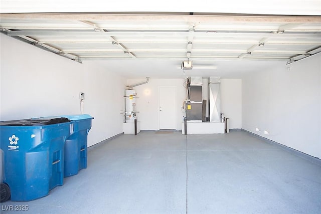 5233 Camino Del Rancho, Las Vegas, NV 89130 - garage with a garage door opener and secured water heater