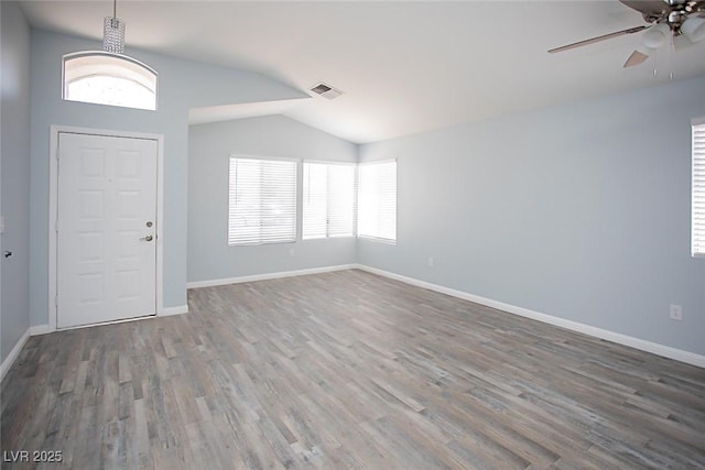 5233 Camino Del Rancho, Las Vegas, NV 89130 - foyer entrance with lofted ceiling, a ceiling fan, wood finished floors, and healthy amount of natural light