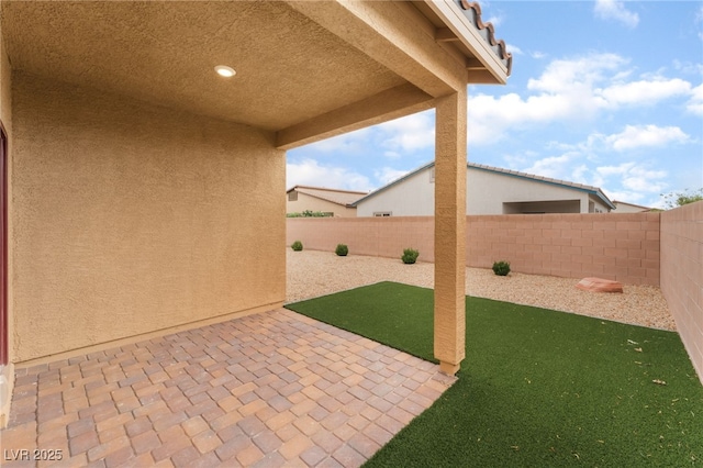 7910 Shimmery St, North Las Vegas, NV 89084 - fenced backyard featuring a patio area