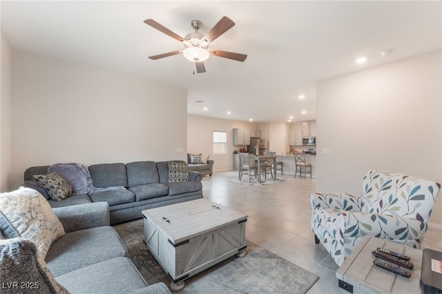 7910 Shimmery St, North Las Vegas, NV 89084 - living area featuring ceiling fan, recessed lighting, and light tile patterned floors