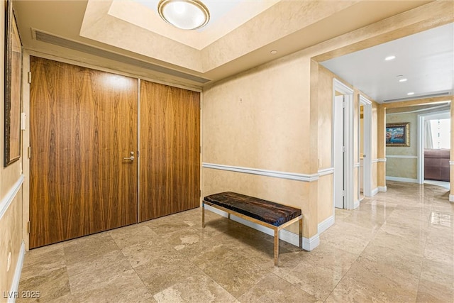 2877 Paradise Rd Unit 702, Las Vegas, NV 89109 - foyer featuring a raised ceiling and baseboards