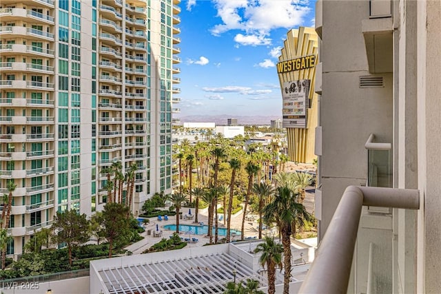 2877 Paradise Rd Unit 702, Las Vegas, NV 89109 - balcony with view of pool and a city view