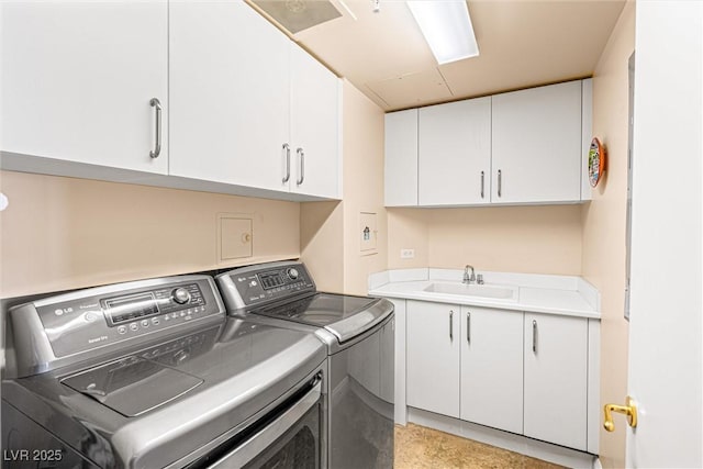 2877 Paradise Rd Unit 702, Las Vegas, NV 89109 - laundry room featuring independent washer and dryer and cabinet space